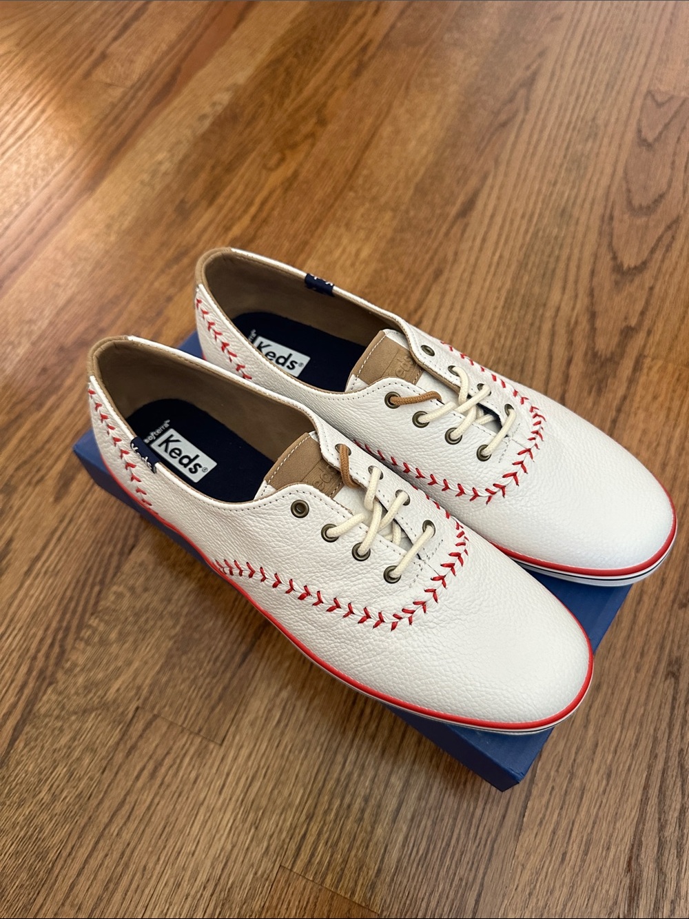 Keds baseball stichingWhite Leather Sneakers with Red Stitching
